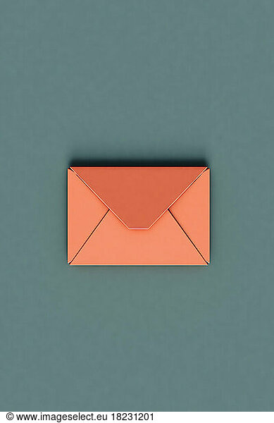 Three dimensional render of pastel red envelope lying against green background