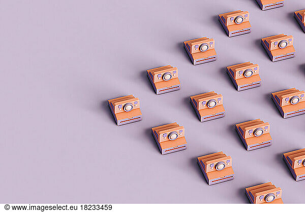 Three dimensional render of rows of instant cameras flat laid against purple background