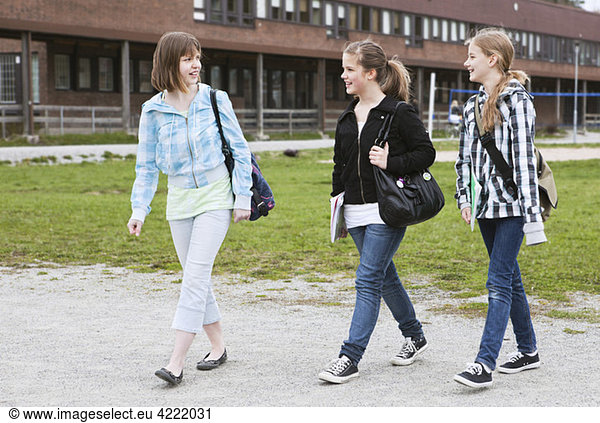 Three girls walking 2