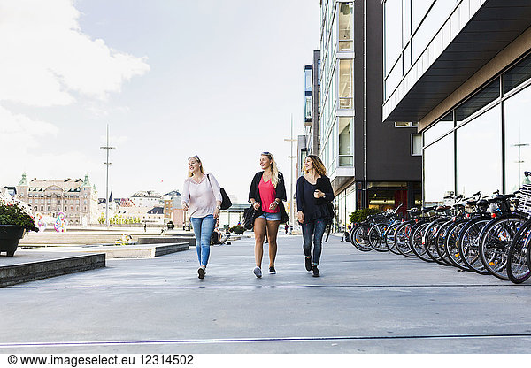 Three women walking together