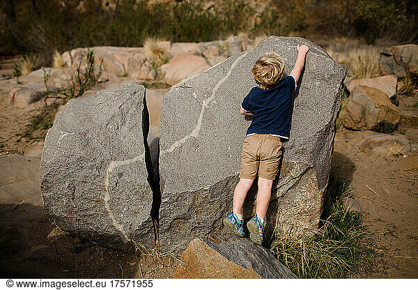 Three Year Old Boy Playing on Rocks at Mission Trails in San Diego