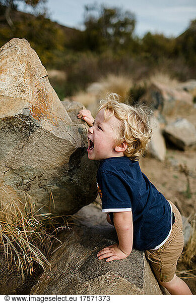 Three Year Old Playing on Rocks at Mission Trails in San Diego