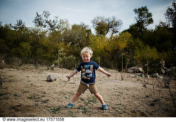 Three Year Old Standing in Field at Mission Trails in San Diego