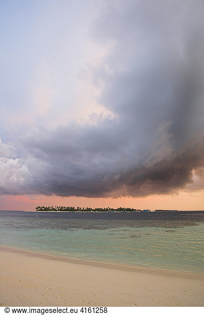 Thunderclouds above an island  Maledives