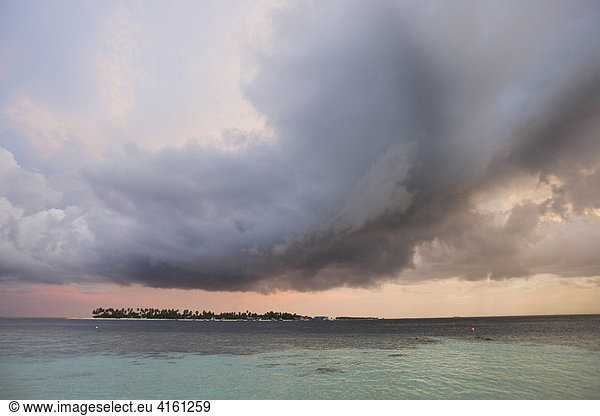 Thunderclouds above an island  Maledives