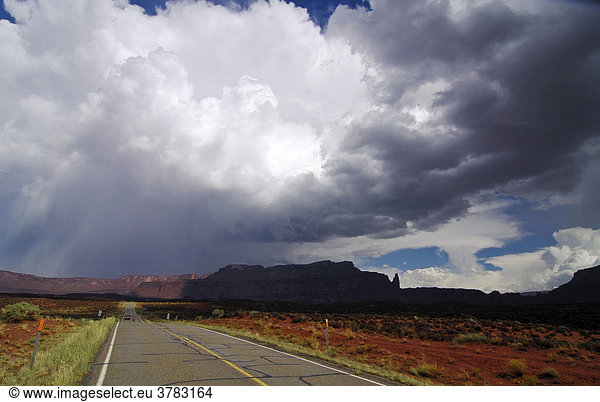 Thunderclouds over a country road  Utah  United States of Amerika