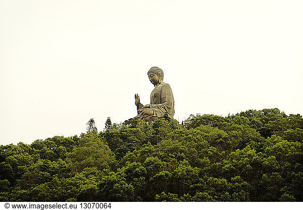 Tian tan Buddha against clear sky