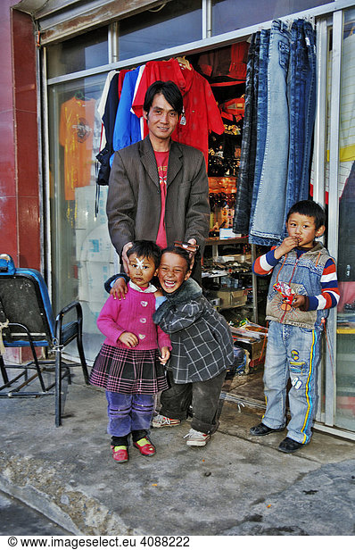 Tibetan father with three children Dangxiong Tibet