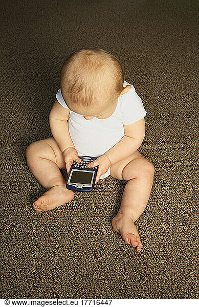 Toddler Playing With Blackberry