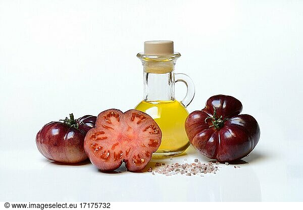 Tomato Mar Azul and bottle of cooking oil  Germany  Europe