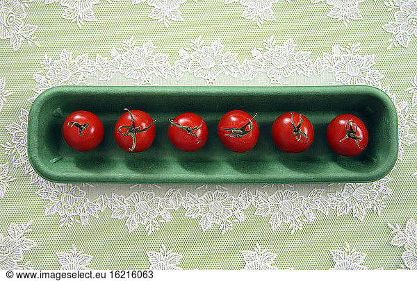 Tomatoes in row  close-up