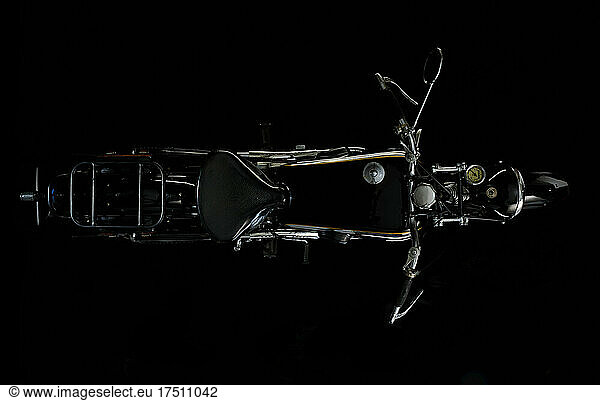 Top view of vintage motorcycle with black background (NSU OSL 351)