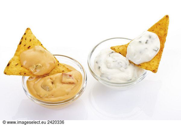 Tortilla Chips with cheese dip and cocktail sauce