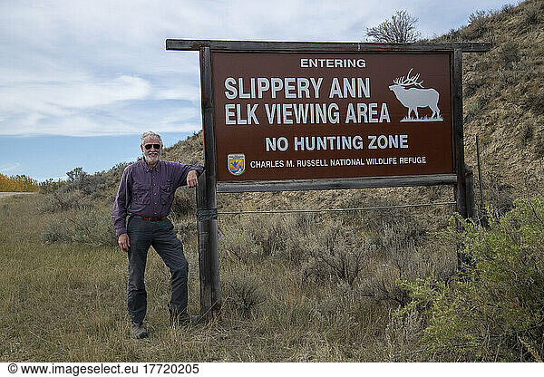 Tourist at the entrance to the Slippery Ann Elk Viewing Area in the Charles M. Russell National Wildlife Refuge; Montana  United States of America