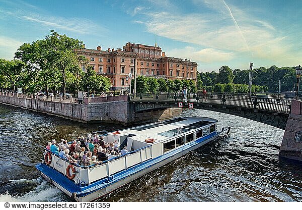 Tourists on a boat near the Mikhailovsky Castle  St. Petersburg  Russia  Europe