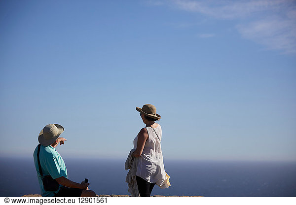 Tourists pointing and looking into distance  Cape Town  Western Cape  South Africa