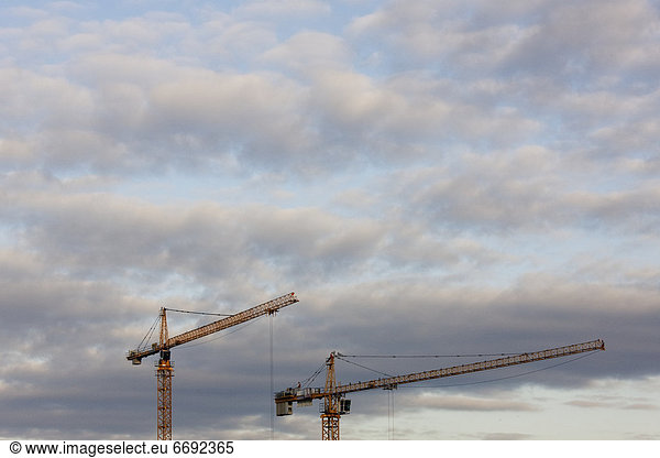Tower Cranes and Clouds
