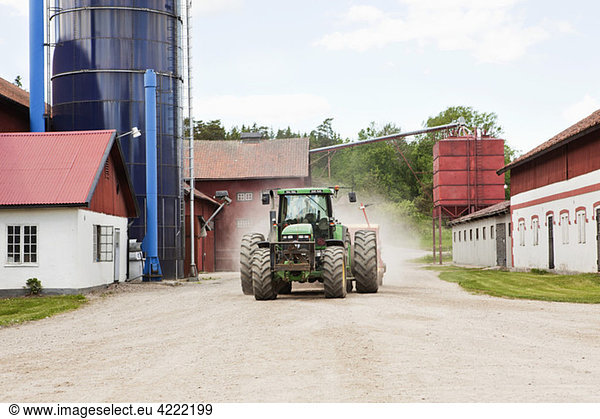 Tractor in farmyard