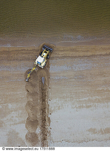 Tractor on beach  aerial view
