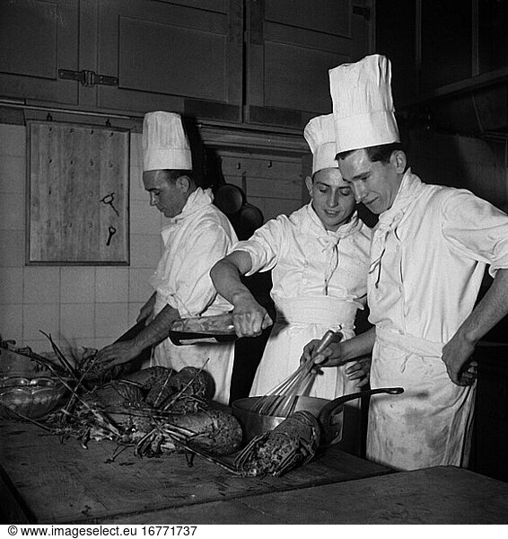 Trade and Industry:
Chefs. View into the kitchen of a restaurant in France: chefs at work. Photo  1962.