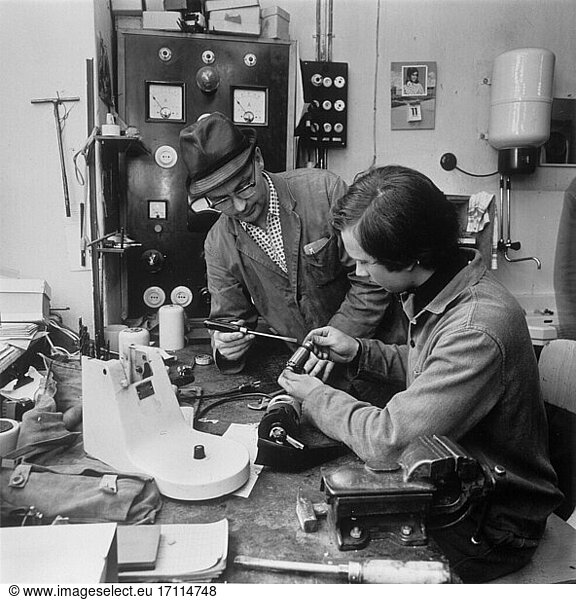 Trade and Industry  Professions  Apprenticeships.
GDR (East Germany). Apprentice with instructor at a workshop in Torgau. Photo  1971