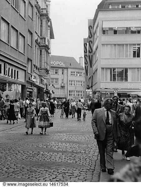 trade  shops  German inner city at the time of the summer clearance sale  1950s
