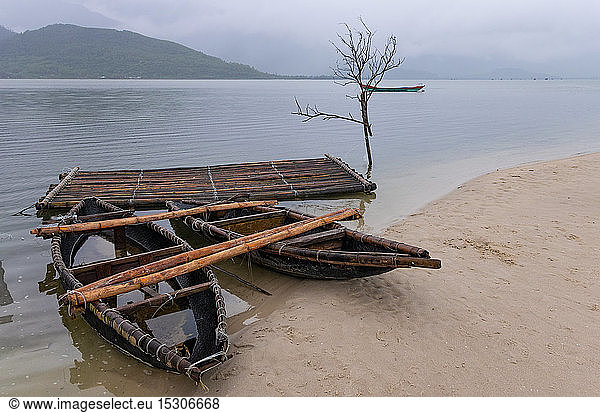 Traditional boats on sandy shore near Da Nang  Vietnam.