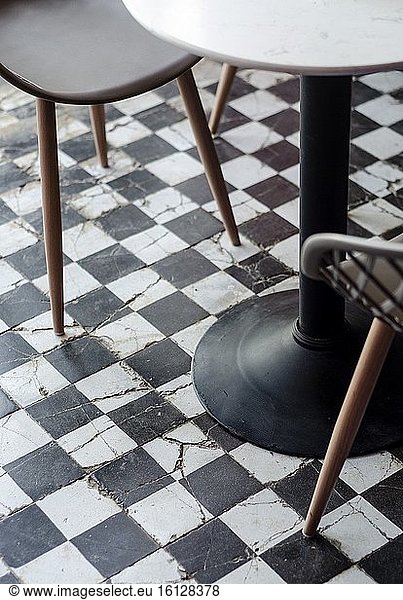 Traditional design old rustic floor tiles detail in trendy Ibiza cafe.