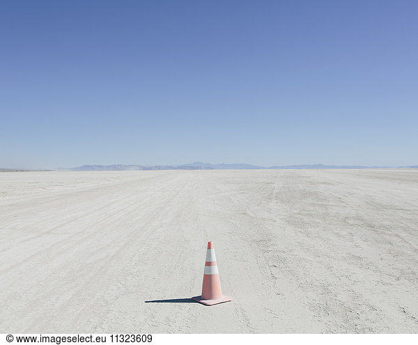 Traffic cone in vast desert  Black Rock Desert  Nevada