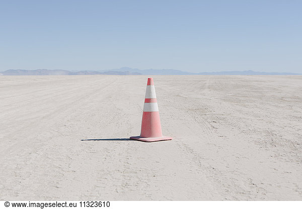 Traffic cone in vast desert  Black Rock Desert  Nevada