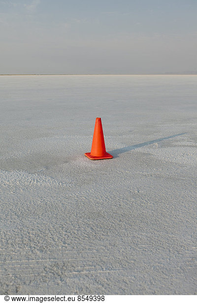 Traffic cone on salt flats  during Speed Week