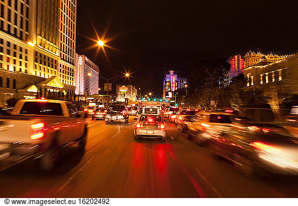 Traffic moving past stores and casinos on the Las Vegas Strip  Las Vegas  Nevada  USA