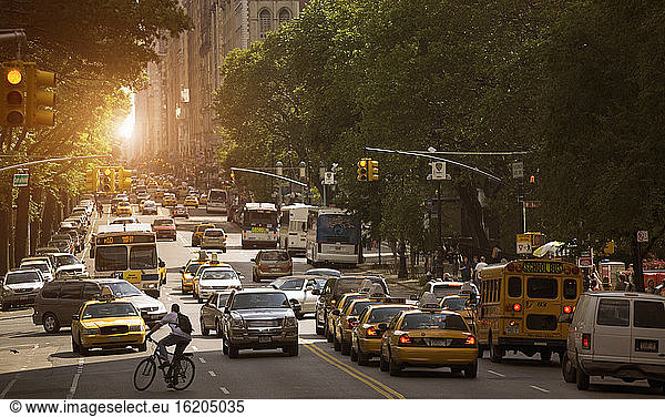 Traffic on road at sunset  New York City  New York  USA