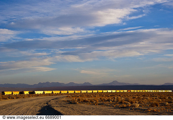 Train Moving Through Desert