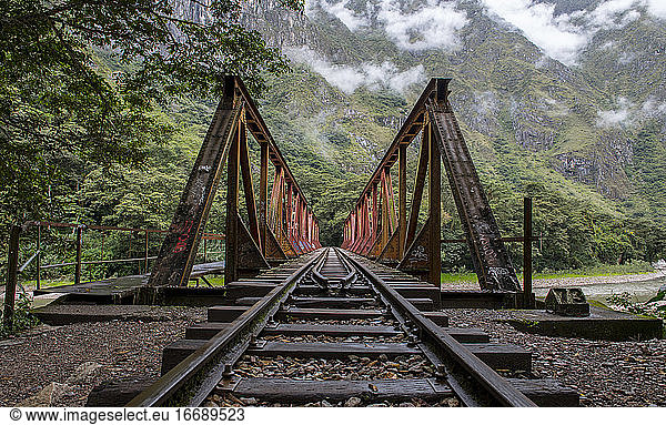 train tracks over a bridge to Aguas Calientes  base for Machu Picchu