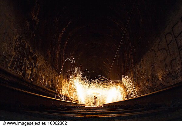 Train tunnel with light trails  low angle view