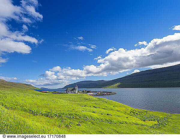 Tranquil scene of sea against blue sky on sunny day  Iceland
