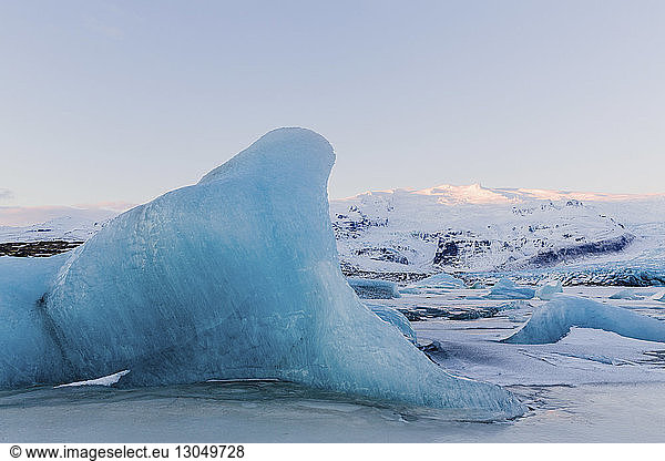 Tranquil view of icebergs in frozen lake during winter