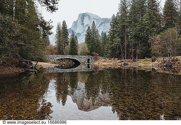 Tranquility on Merced River with Half Dome in distance