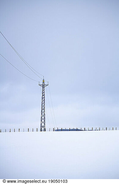 Transmission tower in the snow  Biei  Hokkaido  Japan