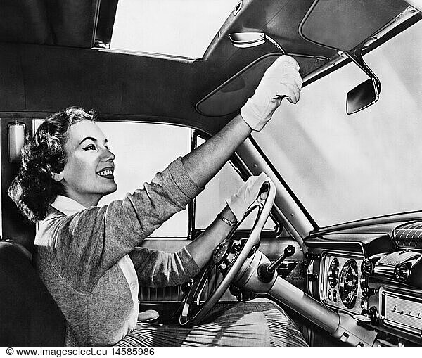 transport / transportation  car  detail  sunshine roof  woman is opening the roof of an Opel  1950s  50s  20th century  historic  historical  sunshine roof  sliding roof  sunroof  sunshine roofs  sliding roofs  sunroofs  power sun roof  handle  handles  wind  winding  wound  driver  drivers  female driver  motorist  drivers  motorists  woman  glove  gloves  automobile  automobiles  car  cars  interior  inner  inboard  half length  female  women  people