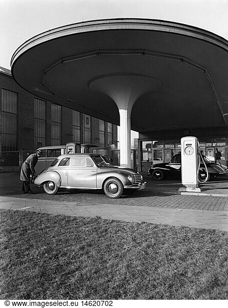 transport / transportation  car  petrol station  man filling up his DKW F 93 car of the Auto Union  Germany  1950s  Germany  50s  20th century  historic  historical  petrol pump  gas pump  petrol pumps  gas pumps  petrol station  gas station  petrol stations  gas stations  service station  service stations  autocar  automobile  motor vehicle  autocars  automobiles  motor vehicles  automobile  automobiles  petrol  gas  gasoline  gas-guzzling  fuel  fuels  fossil fuel  solid fuel  combustible  gaseous fuel  problem fuel  fuel  architecture  man  men  male  people