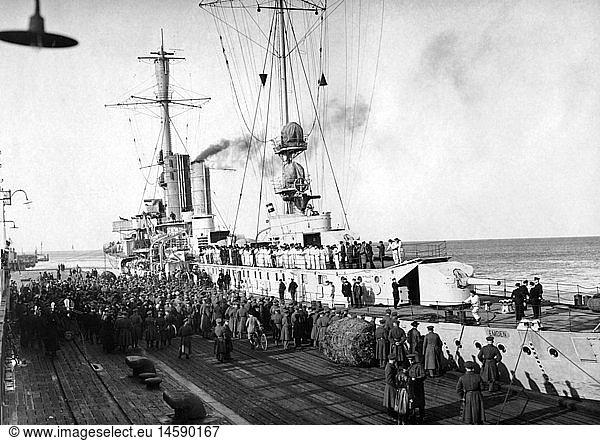transport / transportation  navigation  warships  Germany  Reichsmarine 1922 - 1935  light cruiser Emden  launched and commissioned in 1925  at the harbour shortly before a cruise as a training vessel  circa 1926  ships  warship  German navy  Reichswehr  20th century  historic  historical  1920s  20s  Weimar Republic  port  soldiers  crowd  goodbye  goodby  farewell  ship  people