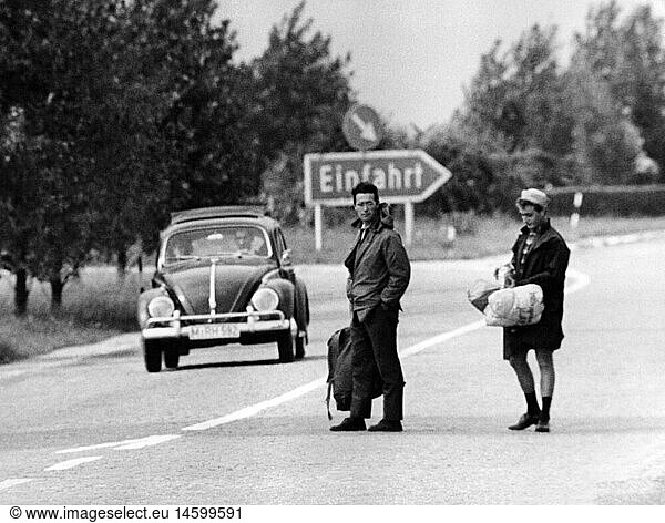 transport / transportation  street  hitch-hiking  backpacking  hitchhiker on a motorway (autobahn) driveway  Germany  1960s