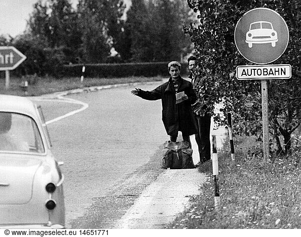 transport / transportation  street  hitch-hiking  backpacking  hitchhiker on a motorway (autobahn) driveway  Germany  1960s