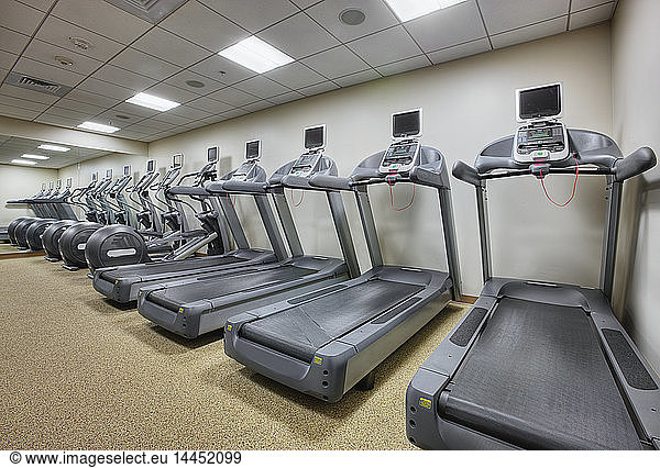 Treadmills in a row at gym