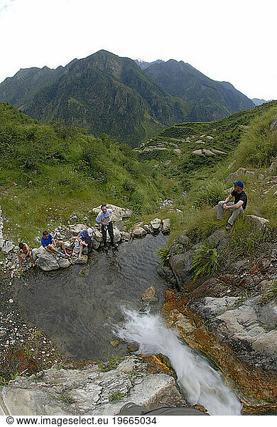 Trekkers in hot springs in Nepal.