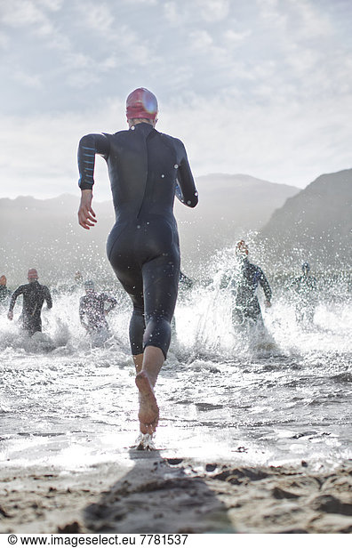 Triathletes at start of swimming race