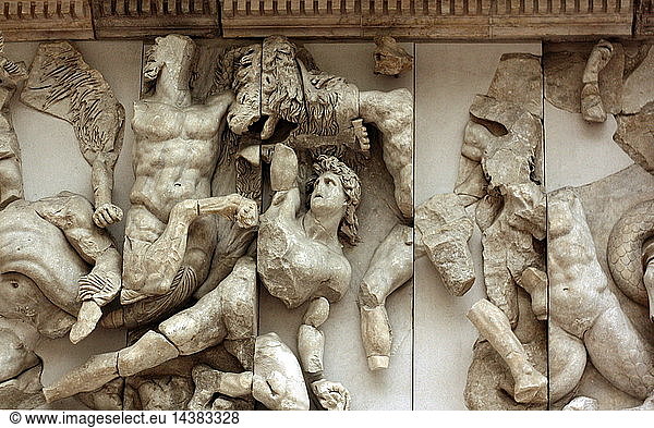 Triton the mythological Greek god  the messenger of the sea. He was the son of Poseidon and Amphitrite. depicted on the Pergamum Altar in the Pergamum Museum in Berlin. It is a monumental construction built during the reign of King Eumenes 11 in the first half of the 2nd century BC on one of the terraces of the acropolis of the ancient city of Pergamum in Asia Minor. It is 35.64 meters wide and 33.4 meters deep. The front stairway is almost 20 meters wide. The base is decorated with a frieze in high relief showing the battle between the Giants and Olympian gods known as the Gigantomachy. In 1878 the German engineer Carl Human began official excavations on the acropolis of Pergamum. The excavation was undertaken in order to rescue the altar friezes and expose the foundation of the edifice. Later  other ancient structures on the acropolis were brought to light.