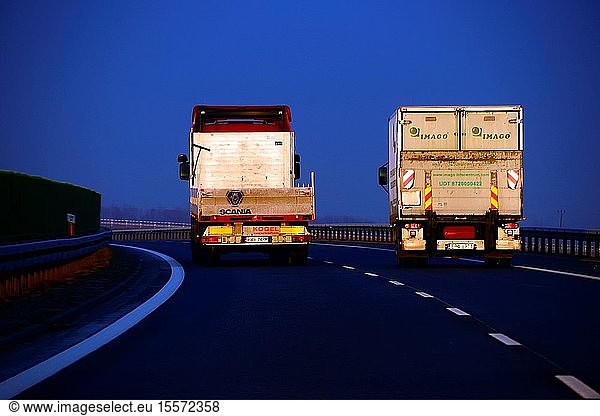 Trucks on highway in winter morning at sunrise. southern Poland  Europe